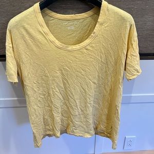 Small yellow American eagle tee